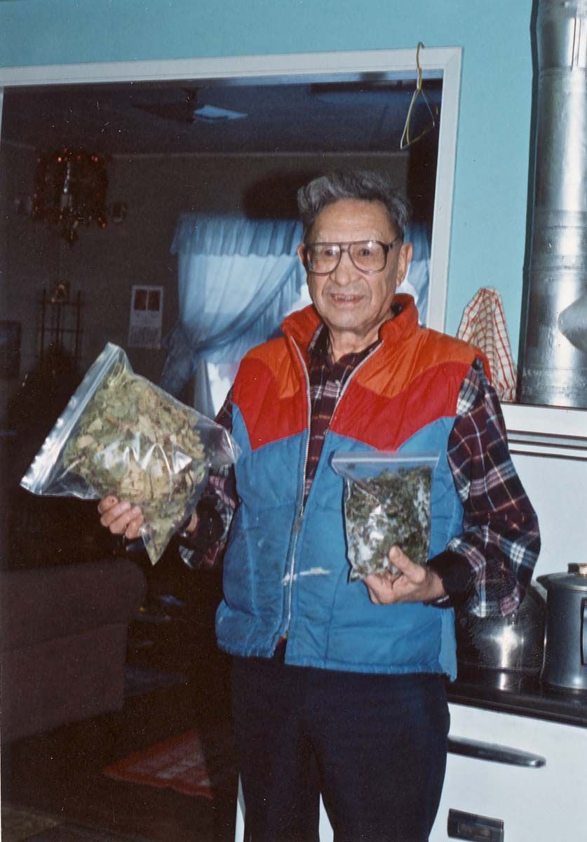 Man with bags of Beach Lovage