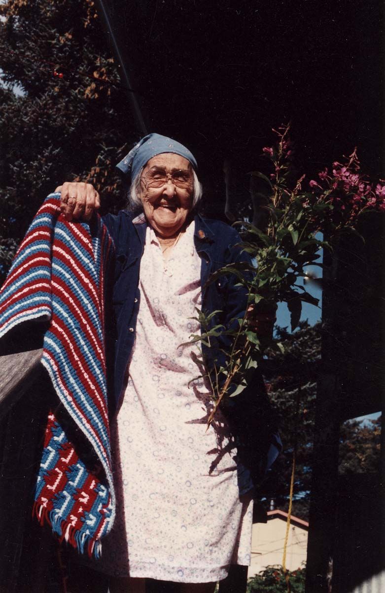 Woman holding fireweed